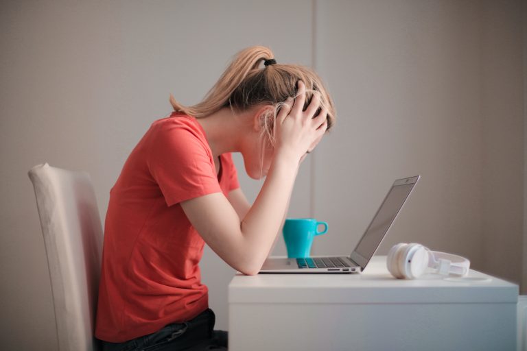 Anxious Woman at Laptop